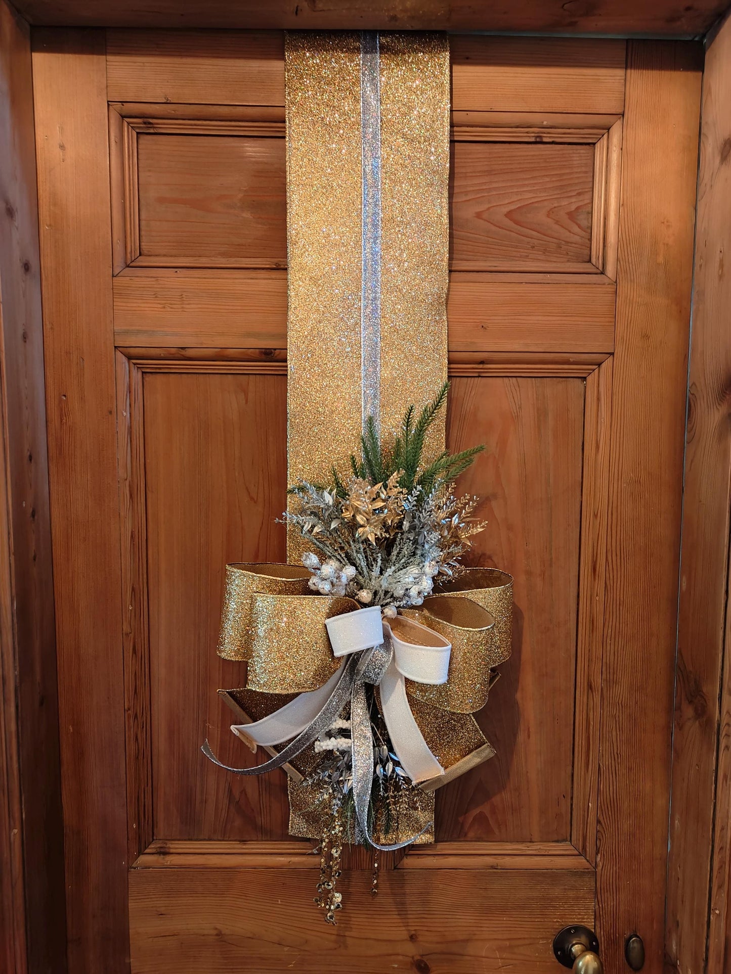 Door hanger traditional Christmas swag over the door large bow