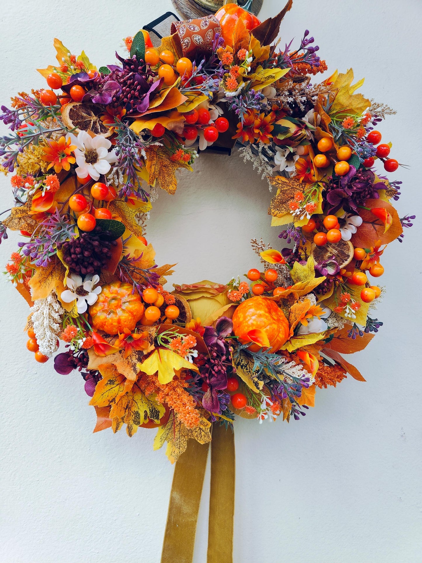 Autumn decoration wreath Autumnal orange brown yellow pumpkins leaves