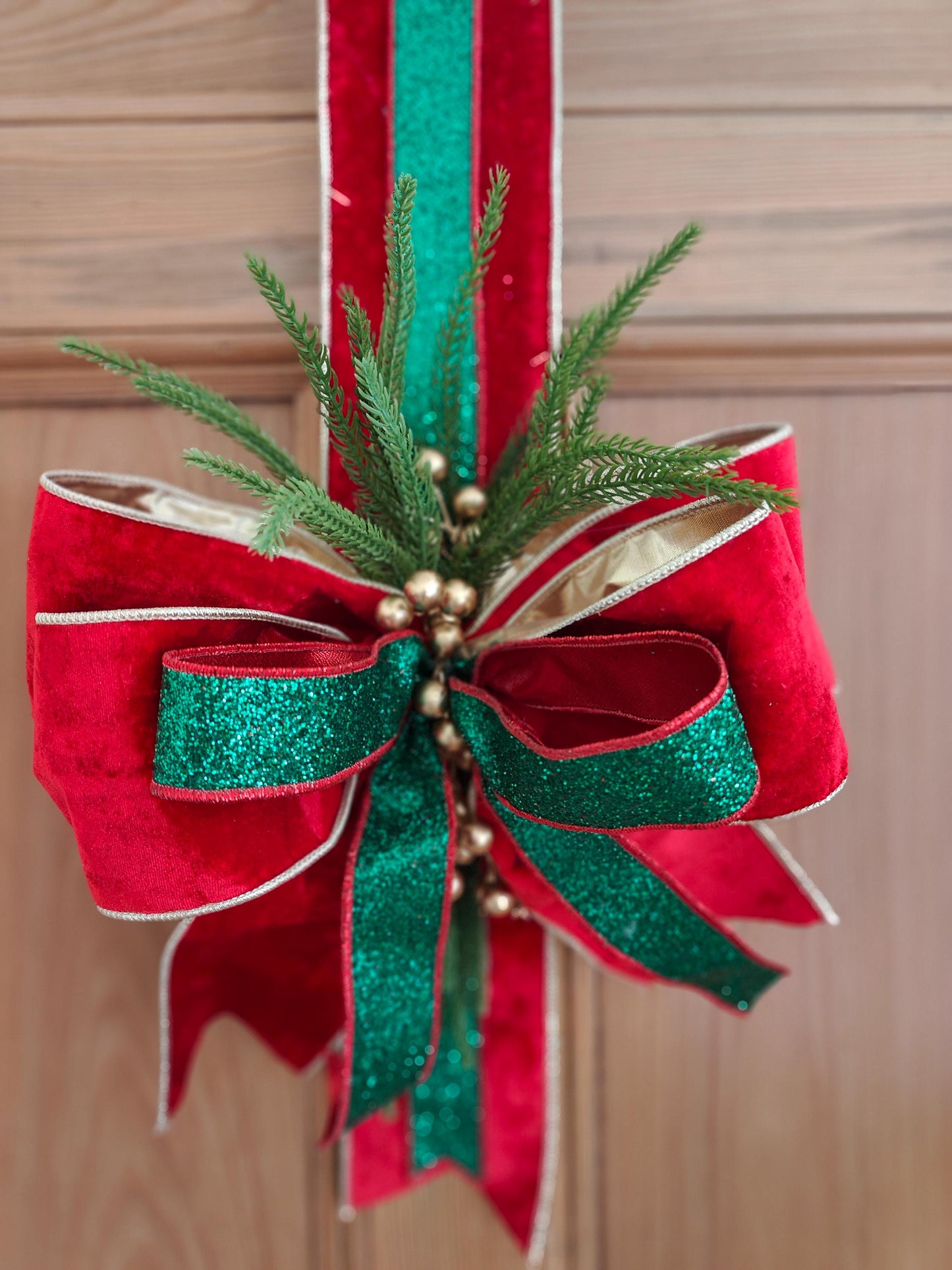 Door hanger traditional Christmas swag over the door large bow